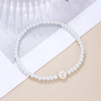 Witte initialen armband e