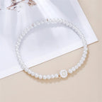 Witte initialen armband g