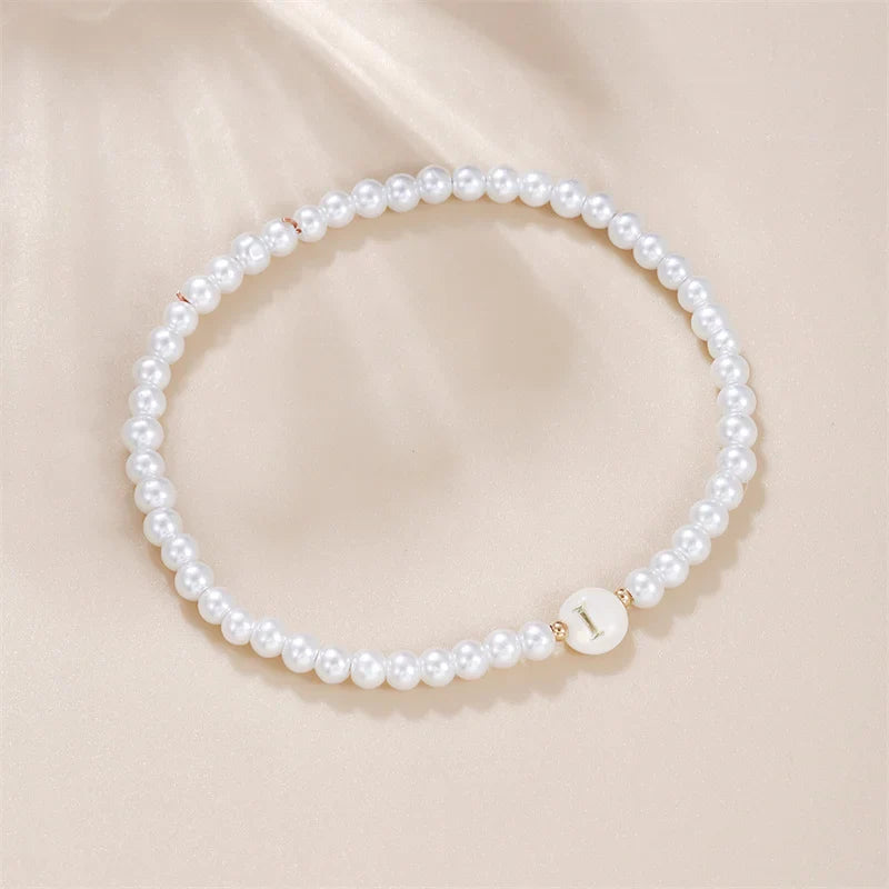 Witte initialen armband i