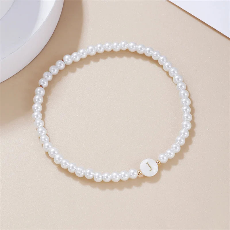 Witte initialen armband j