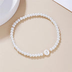 Witte initialen armband j