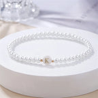 Witte initialen armband k