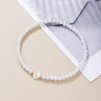 Witte initialen armband l