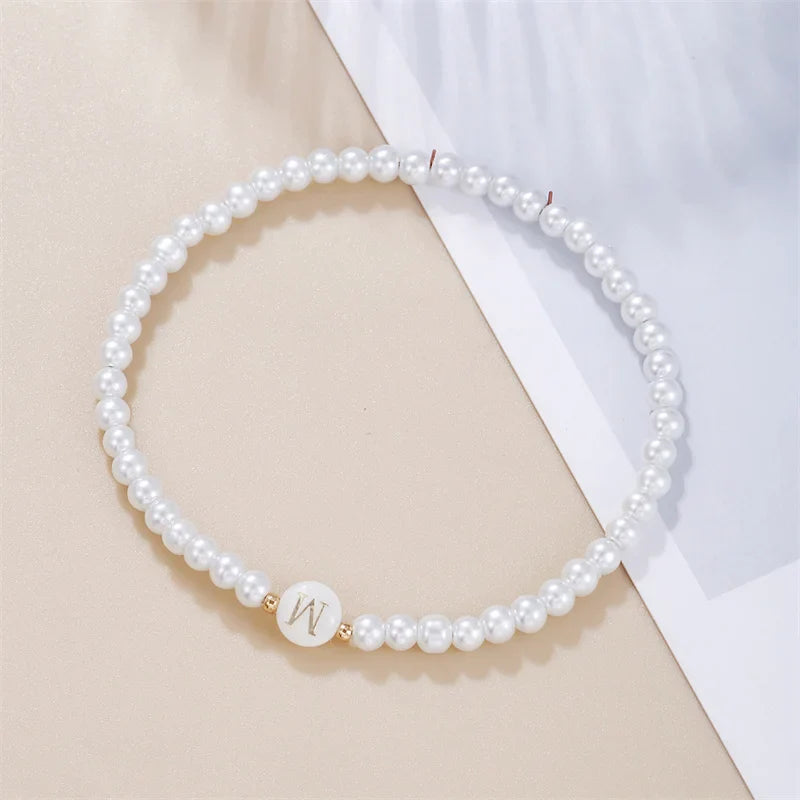 Witte initialen armband w
