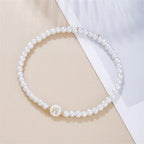 Witte initialen armband w