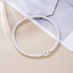 Witte initialen armband x