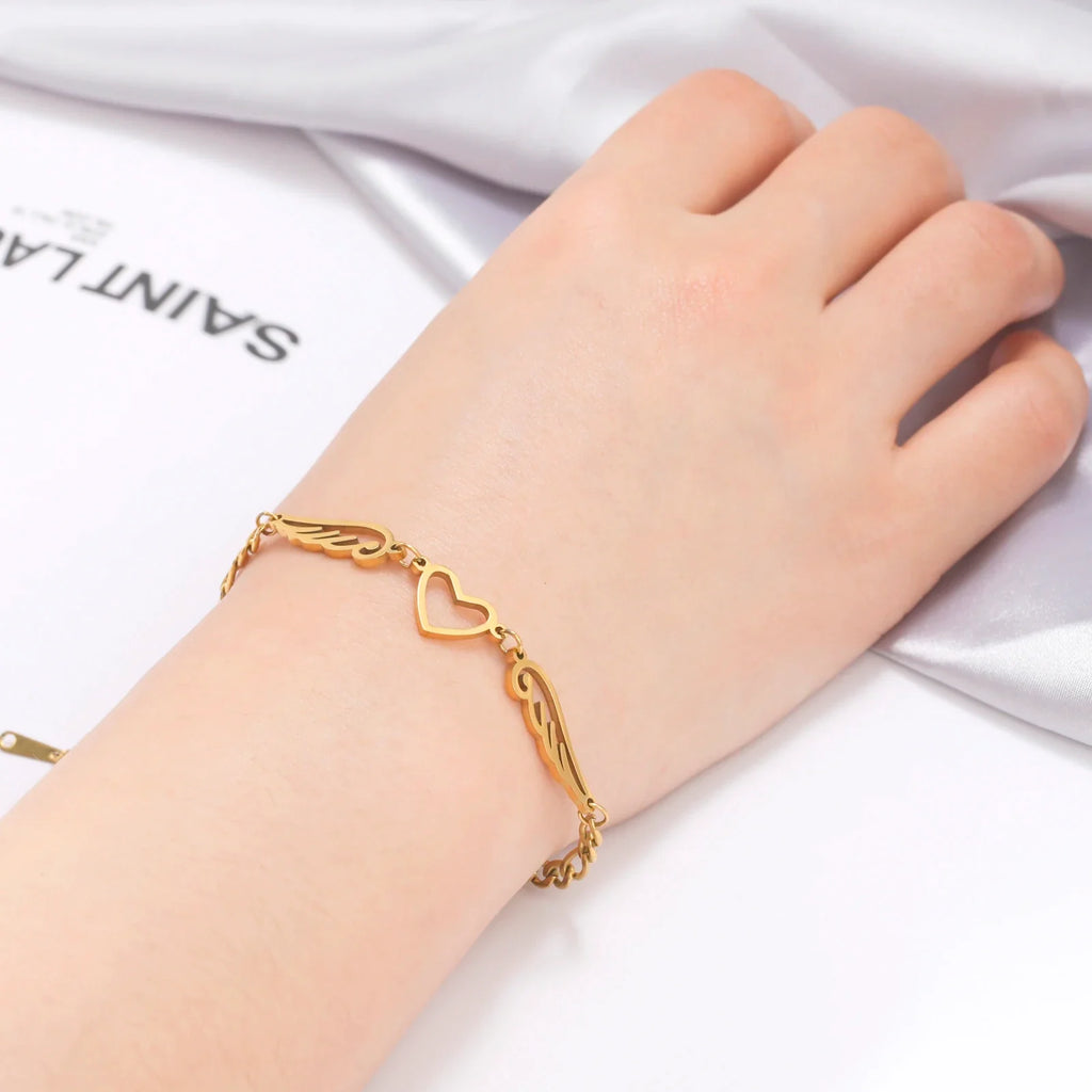 Armband hart en engelenvleugels goud