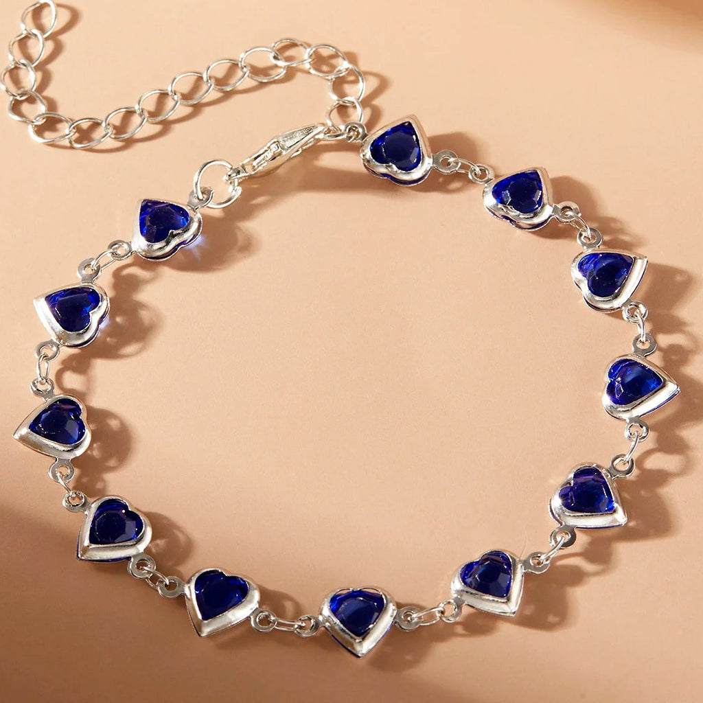 Armband met geëmailleerde hartjes zilver en blauw