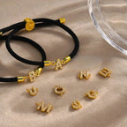 Gekleurde armband met strass-initiaal - letter 