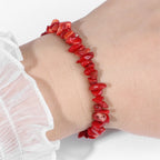 Armband koraal kleine rode splinters