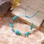 Koordarmband met schelp en blauwe zeeschildpad