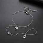 Hand- en vingerarmband met Joodse beschermingshangers Chai, <span data-glossary-id="etoile-de-david">Davidsster</span> en Fatma-hand Chai zilver