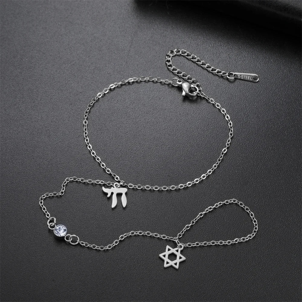Hand- en vingerarmband met Joodse beschermingshangers Chai, <span data-glossary-id="etoile-de-david">Davidsster</span> en Fatma-hand Chai zilver