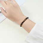 Elastische armband met drievoudige bescherming – tijgeroog, onyx en hematiet
