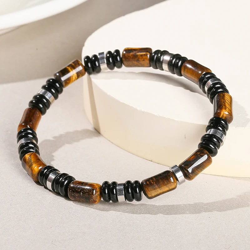 Elastische armband met drievoudige bescherming – tijgeroog, onyx en hematiet