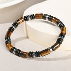 Elastische armband met drievoudige bescherming – tijgeroog, onyx en hematiet
