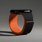 Vervangende band voor Apple Watch in magnetisch siliconen zwart en oranje