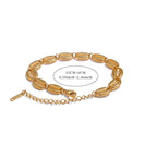 Vergulde armband met kauri-schelp