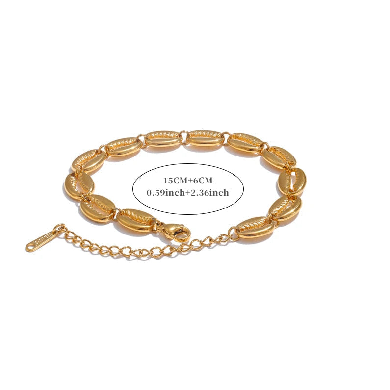 Vergulde armband met kauri-schelp