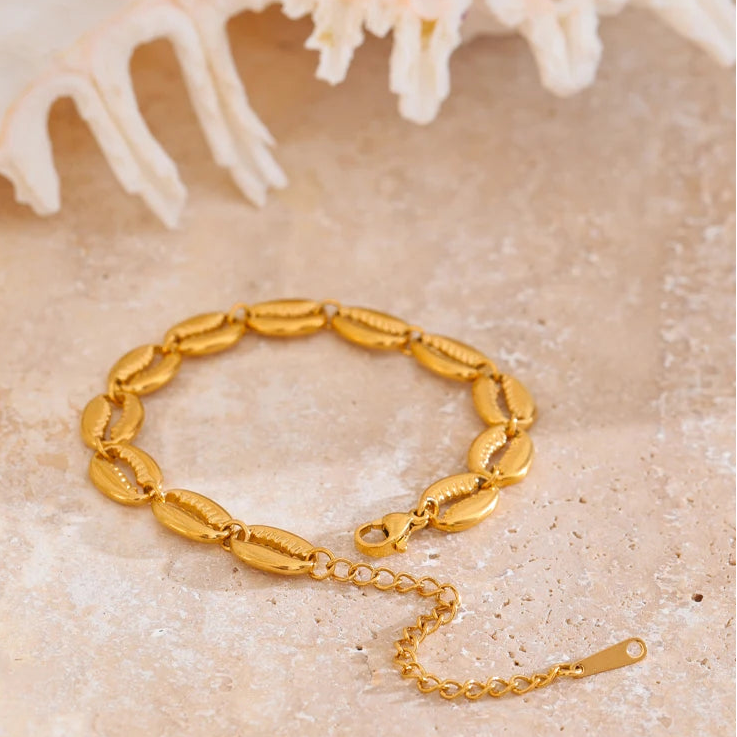 Vergulde armband met kauri-schelp