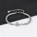 Dubbele schakelarmband met kruis