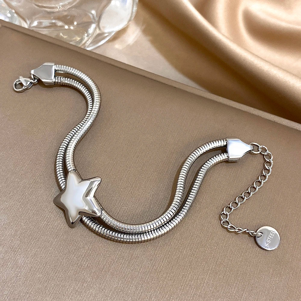 Armband met dubbele rij en bolle ster zilver