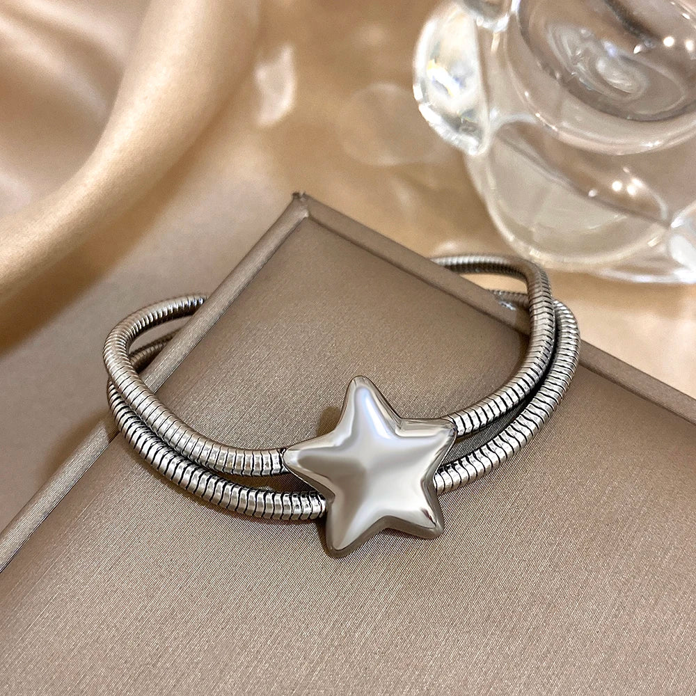 Armband met dubbele rij en bolle ster zilver
