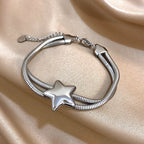 Armband met dubbele rij en bolle ster zilver
