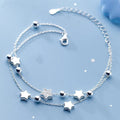 Dubbele armband met zilverkleurige sterren