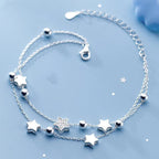 Dubbele armband met zilverkleurige sterren