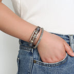 Armband van leer met schelp en zeester in grijs