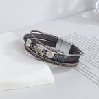Armband van leer met schelp en zeester in grijs