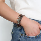 Armband van leer met schelp en zeester in bruin