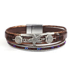 Armband van leer met schelp en zeester in bruin