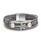 Armband van leer met schelp en zeester in grijs