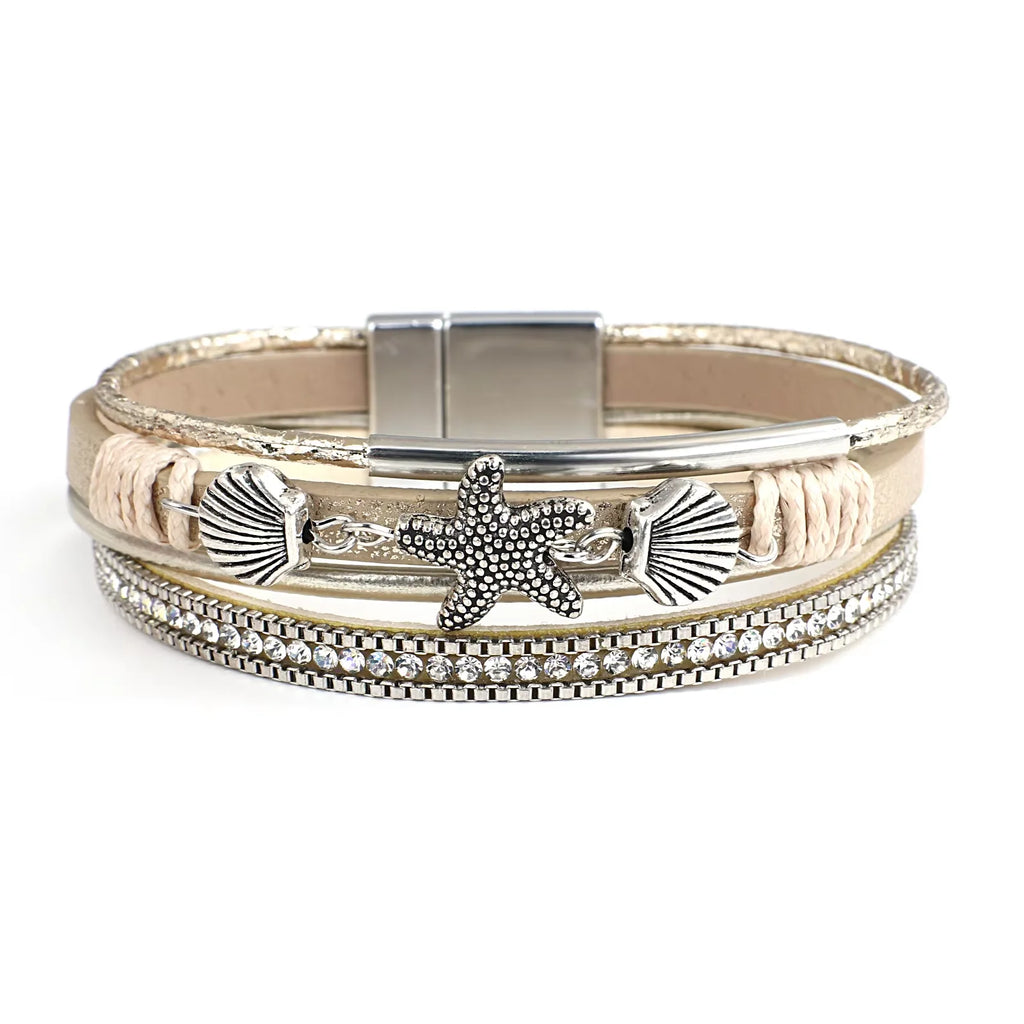 Armband van leer met schelp en zeester in witgoud