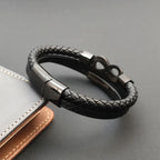 Meerstrengs gevlochten leren armband met oneindigheidssymbool