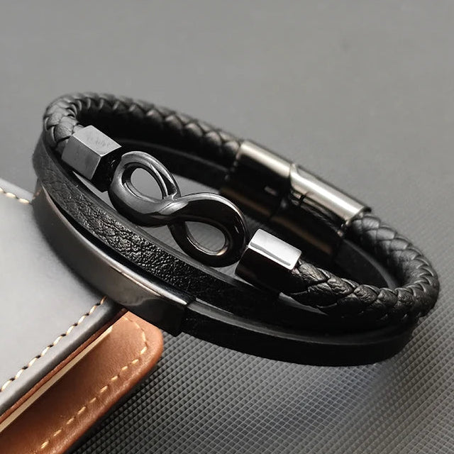 Meerstrengs gevlochten leren armband met oneindigheidssymbool