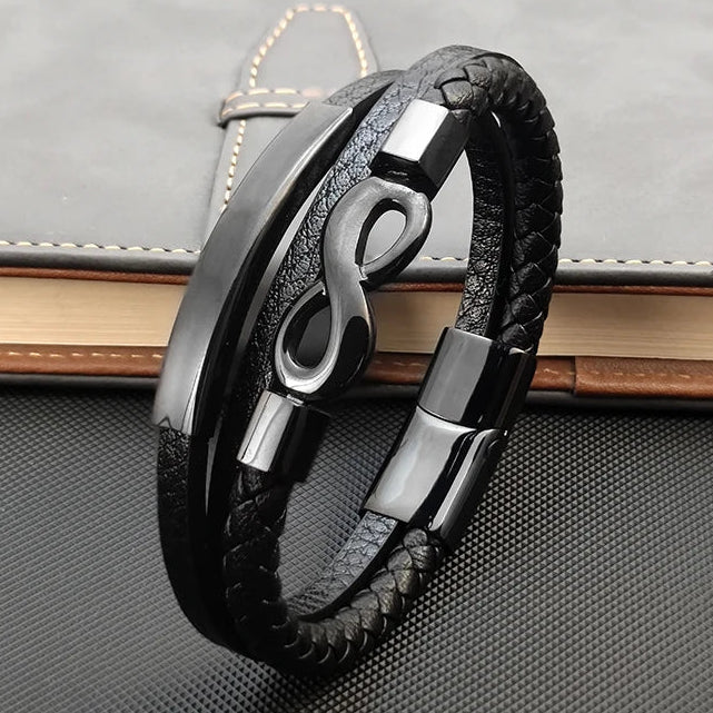 Meerstrengs gevlochten leren armband met oneindigheidssymbool 