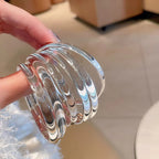 Armband van gepolijste kattenoogsteen 