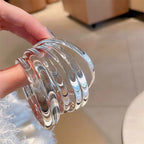 Armband van gepolijste kattenoogsteen 