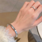 Armband van gepolijste kattenoogsteen 