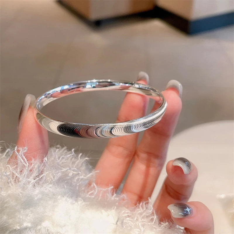 Armband van gepolijste kattenoogsteen 