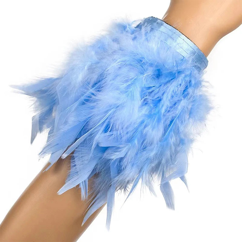 Armband met roze veer in mistig blauw