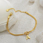 Armband met initiaal en strik - letter 