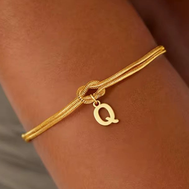 Armband met initiaal en strik - letter 