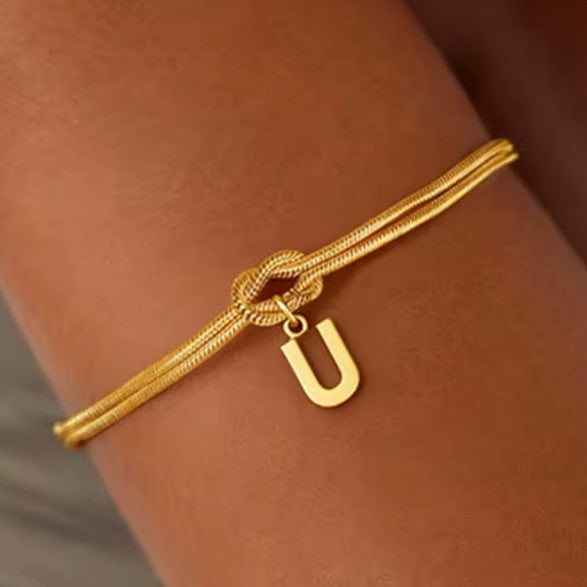 Armband met initiaal en strik - letter 