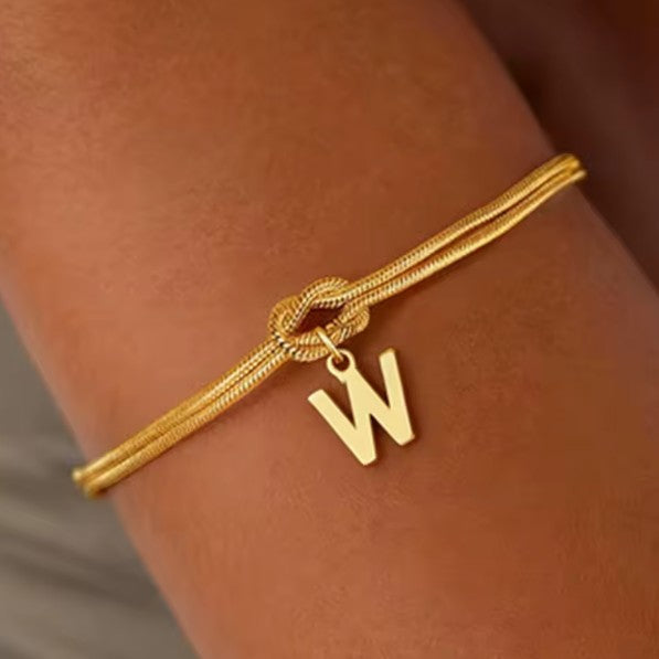 Armband met initiaal en strik - letter 