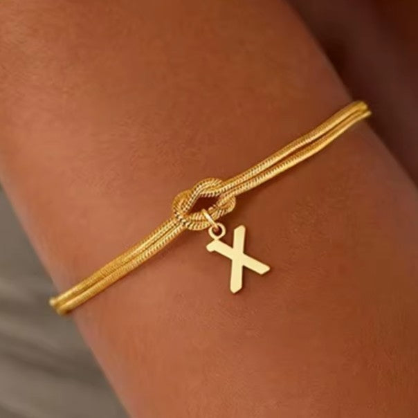 Armband met initiaal en strik - letter 