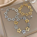 Armband met meerdere geometrische sterren goud en zilver